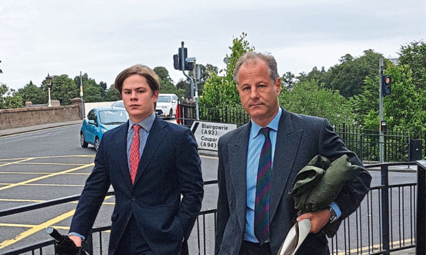 Cadogan, seen with his father Viscount Chelsea, right, as they leave court.
