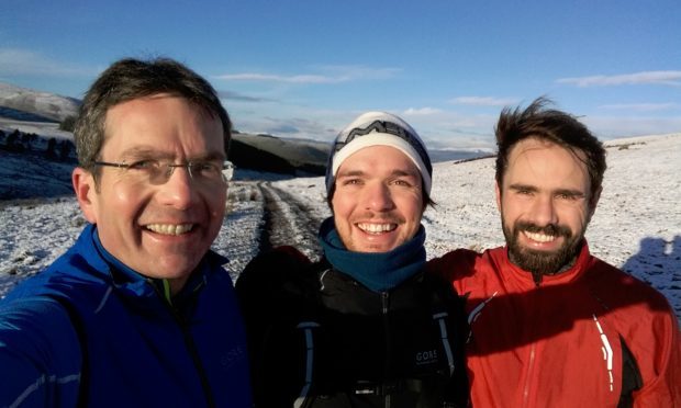 Alan Matthew with sons Cameron and Gregor.