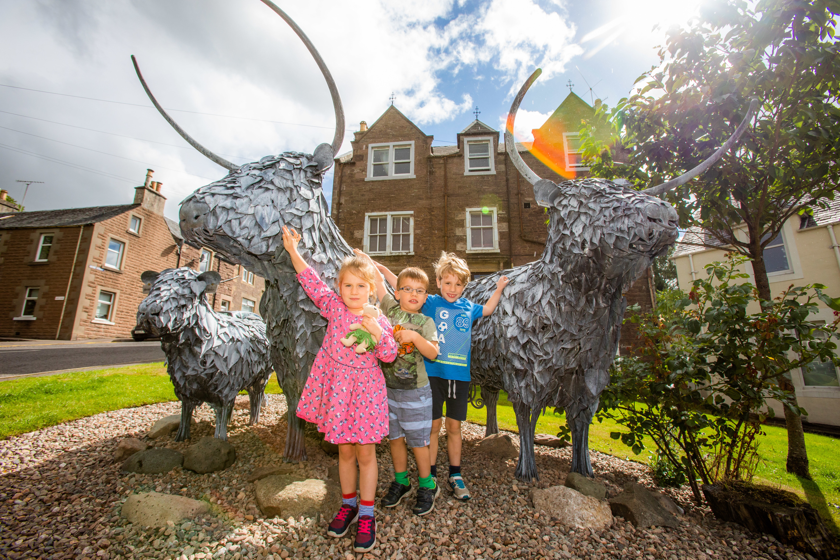 The Cows, being visited by the Cunningham family (left to right), Layla Cunningham (aged 4), twin brother Tommy Cunningham  and brother Daniel Cunningham (aged 6, all from Perth).