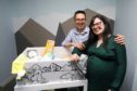 Gary Phillips and Anna McFarlane received Scotland's 50,000th baby box.