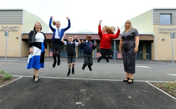Pupils and head teachers outside the new Coldside Campus on Friday