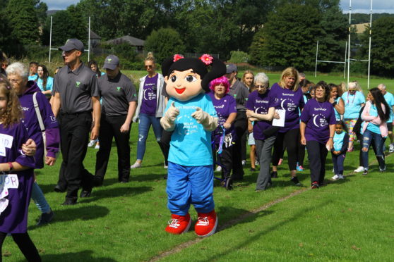 Walkers on the Relay for Life at Morgan Rugby Club.