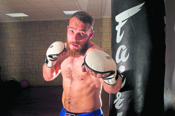 Local lad Frazer has taken up MMA fighting and he's now got a shot at the title.