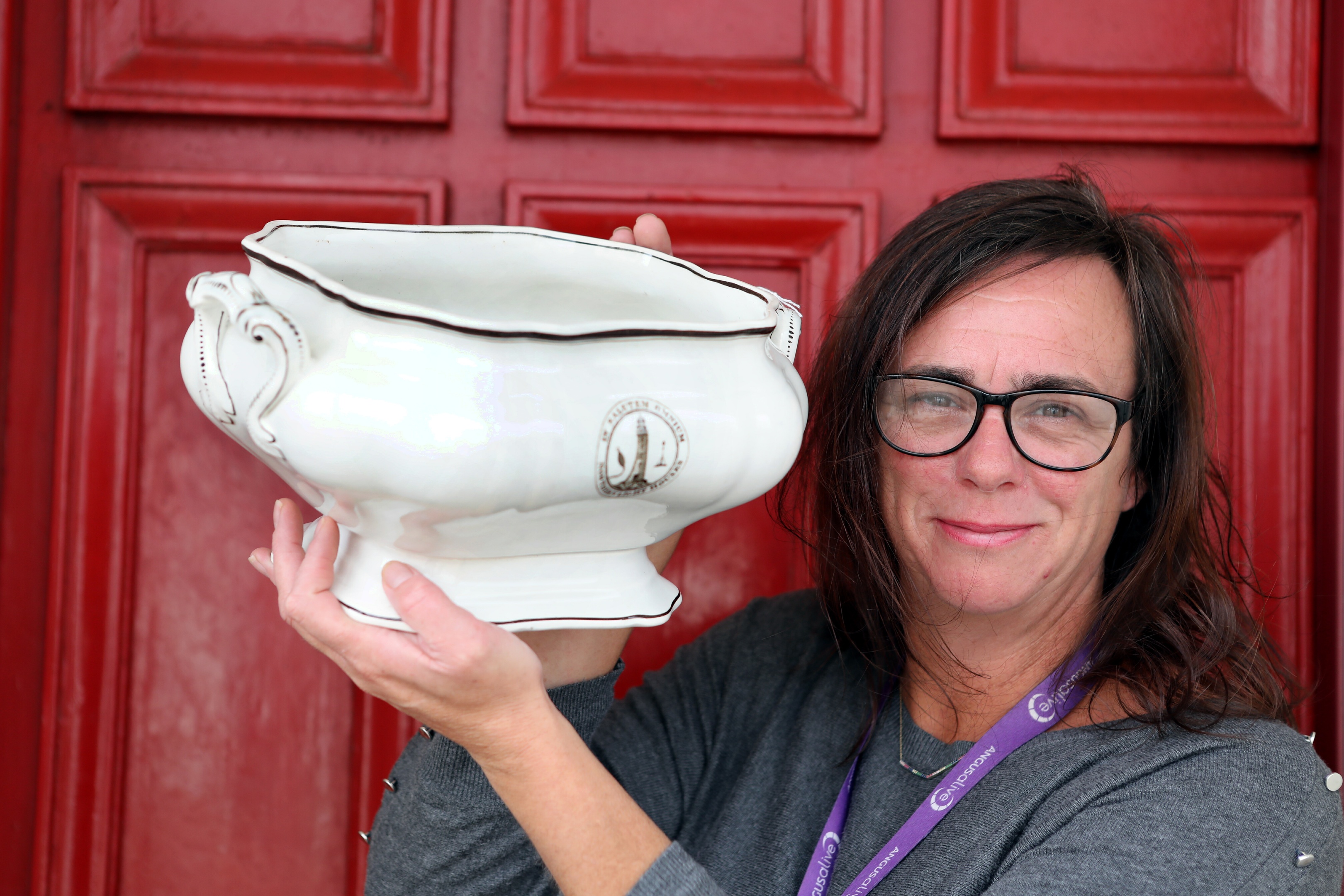 Museum officer Kirsten Couper with a 19th century dish donated by the family of former Bell Rock keeper John Simpson