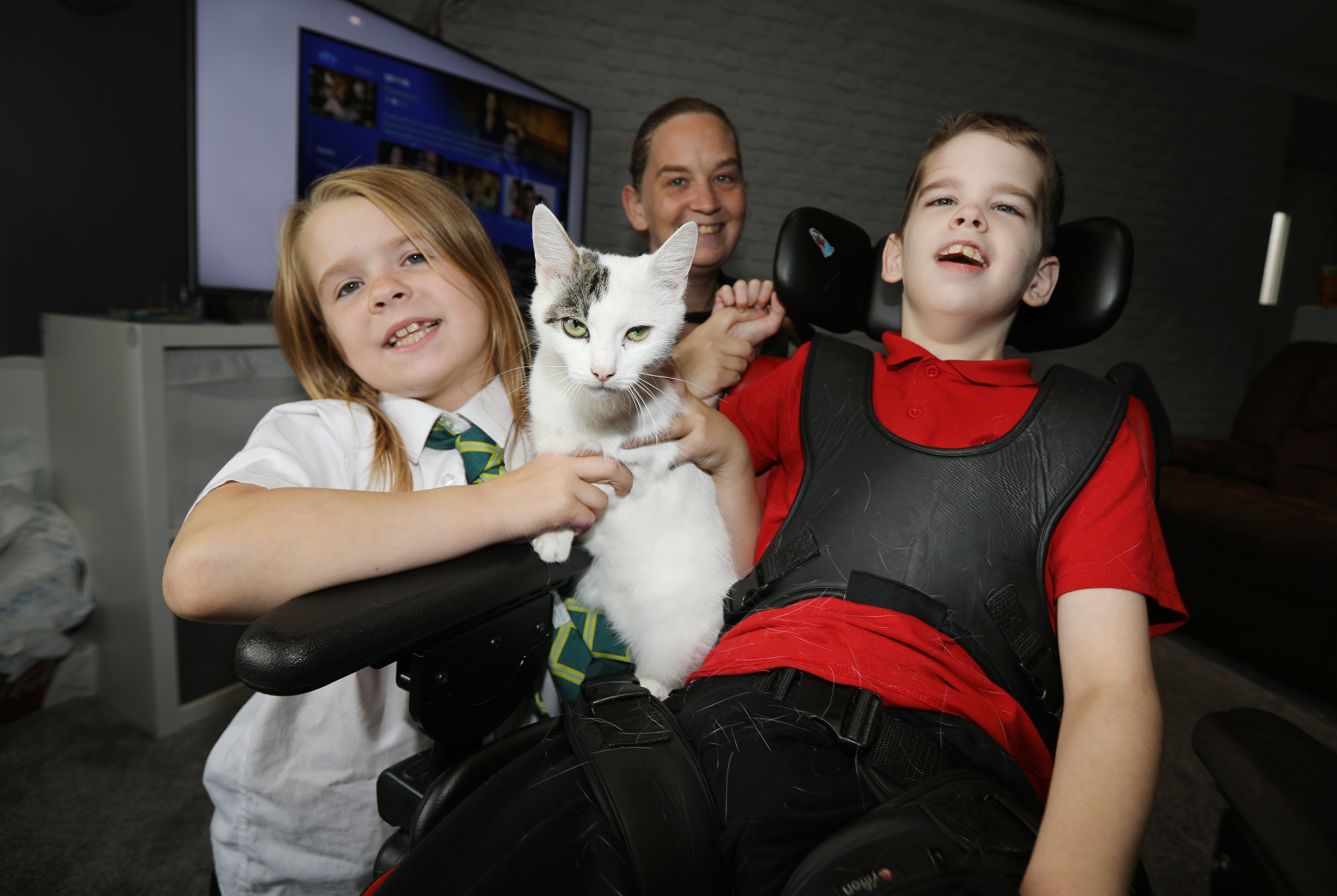 Storm the cat is back with its family - mum Shelley Forrester, with Jonathon (9) & Leah  (8)