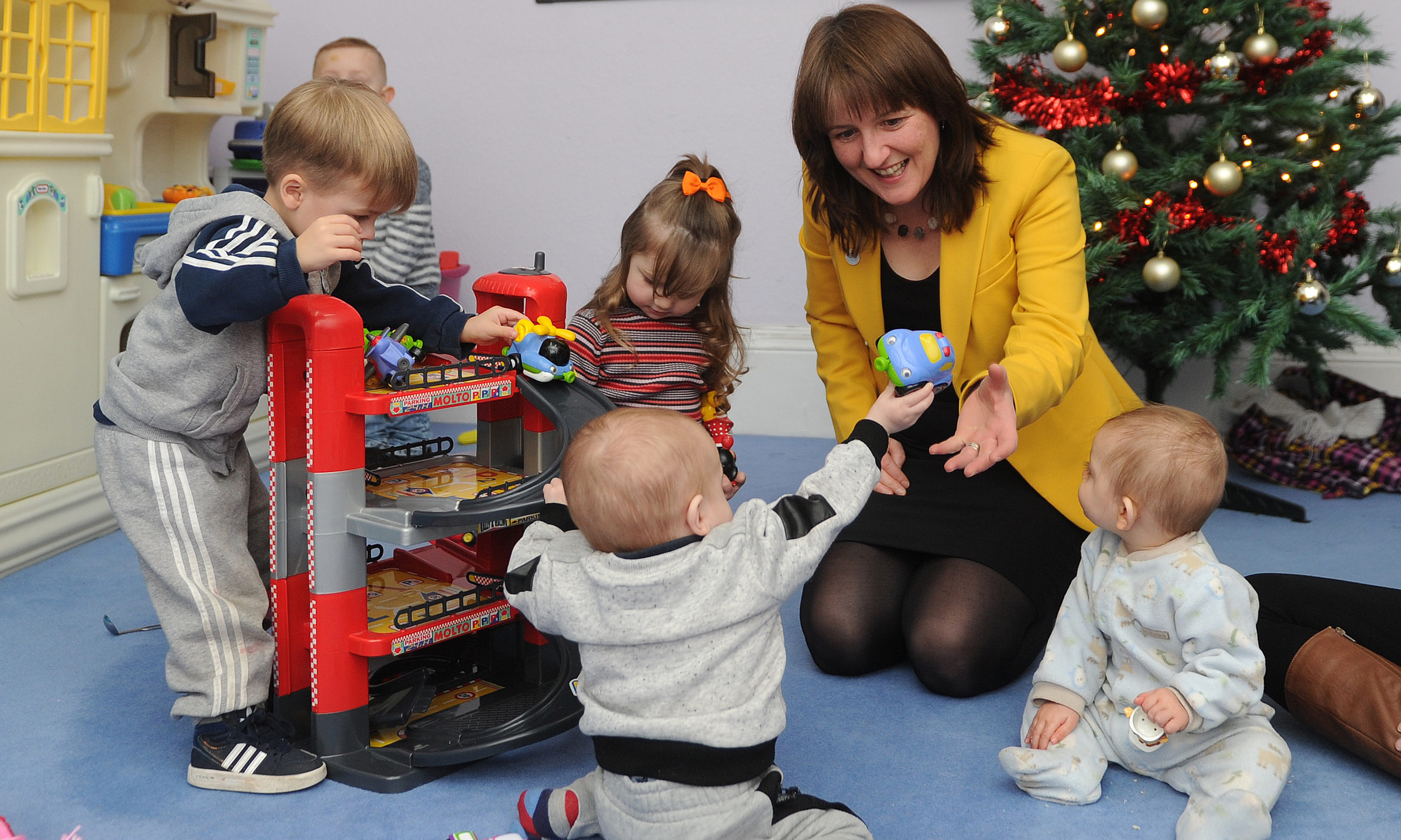 Minister for Childcare and Early Years, Maree Todd, with some local youngsters.