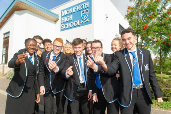 Some of the pupils who will be joining Donald Dewar in his half marathon attempt on Saturday