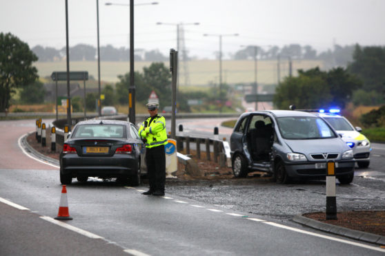 A two-car accident at the Tealing junction