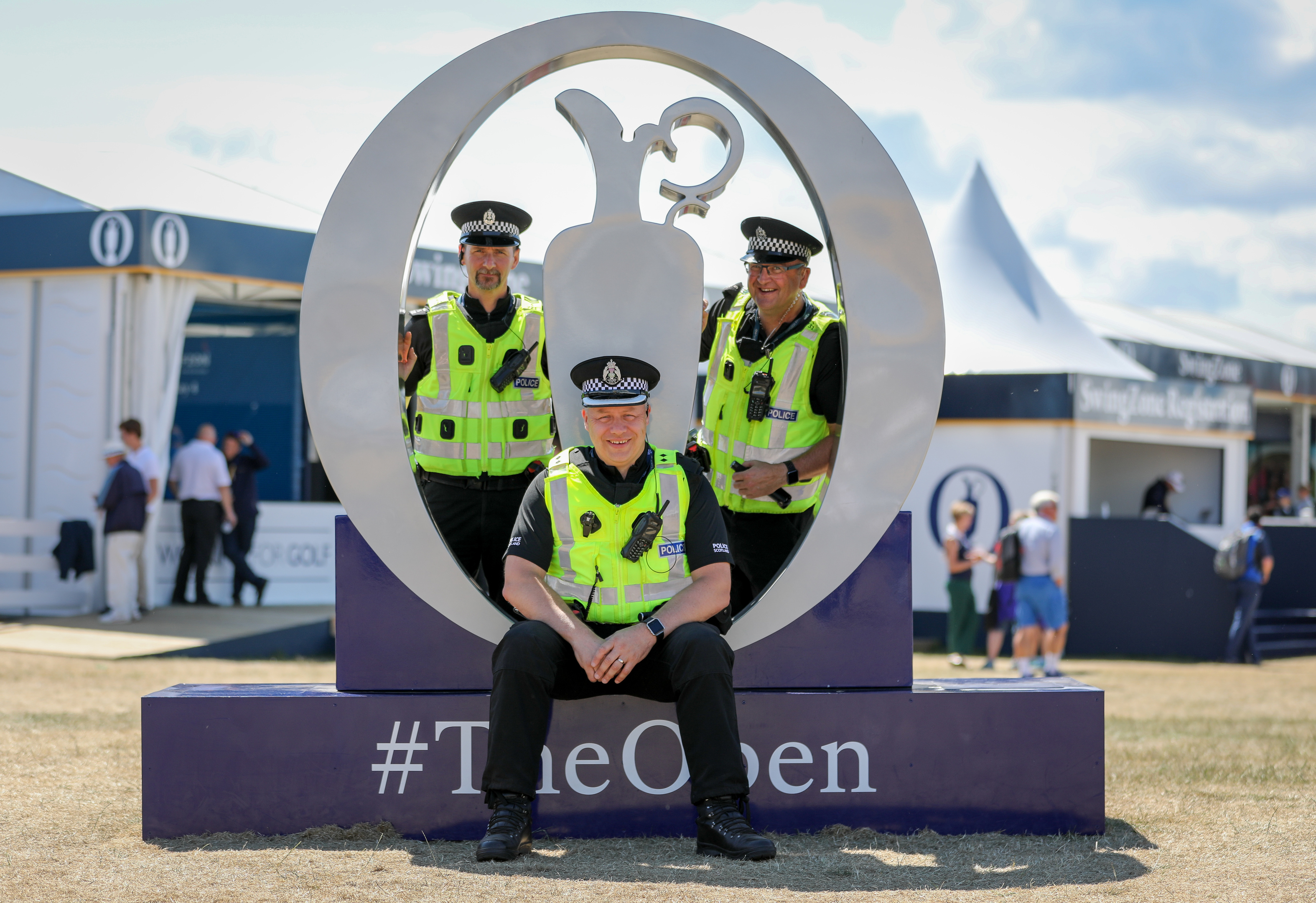 Sgt Peter Lorrain-Smith, Insp Stephen Hunter and Sgt Terry Reid in the tented village at The Open.
