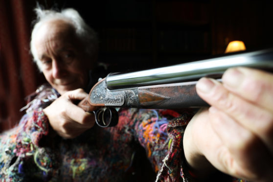 Master gun-engraver Malcolm Appleby is reunited with his 'Pheonix' gun prior to its auction at Gleneagles.