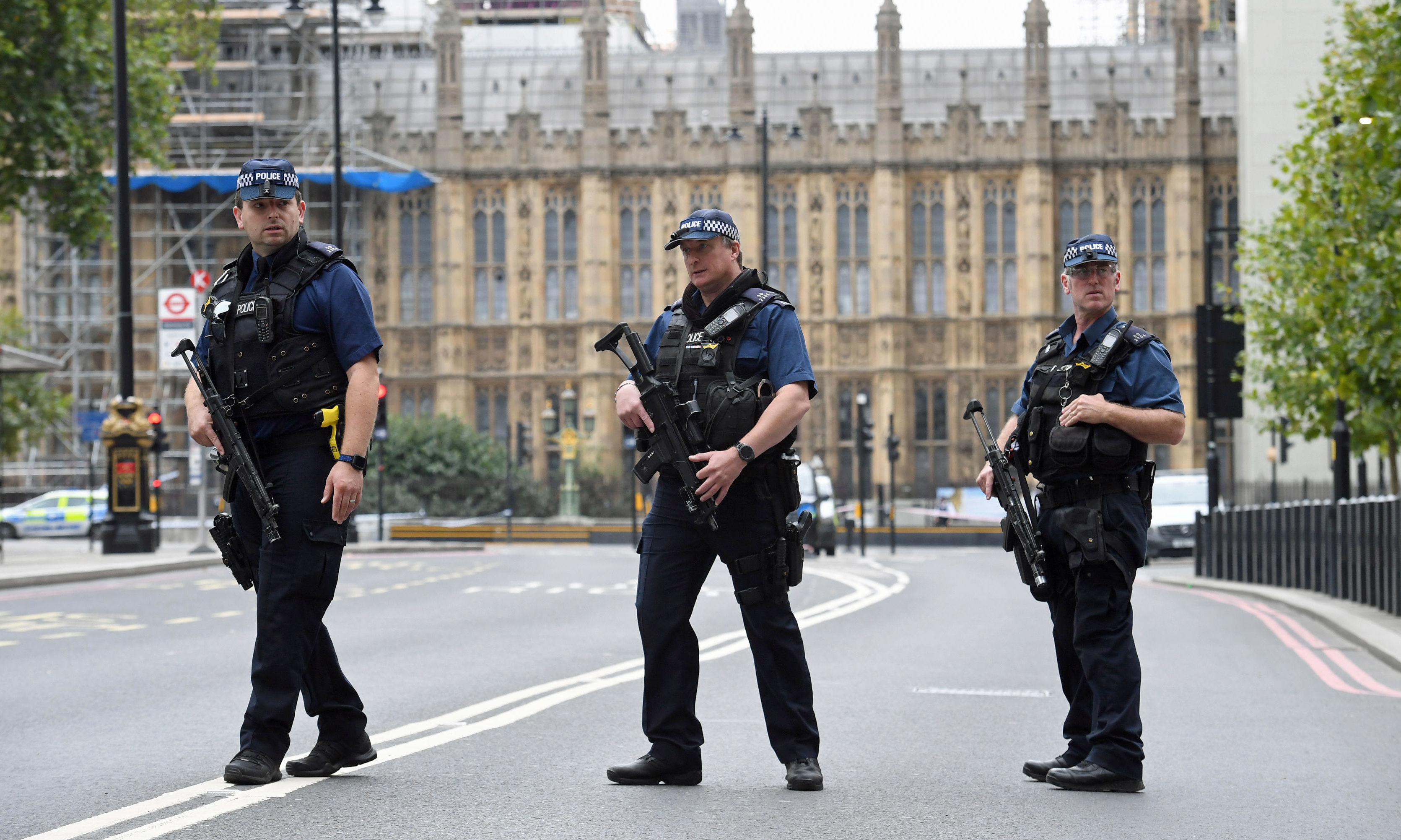 Armed police on Victoria Embankment in Westminster, central London, after a car crashed into security barriers.