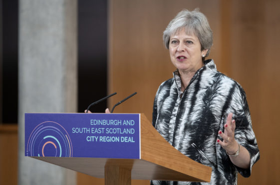 Prime Minister Theresa May speaks at the University of Edinburgh before signing the Edinburgh and South East Scotland City Region Deal