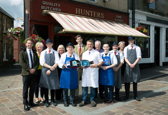 Lord Duncan (centre) during his visit to Hunters of Kinross.