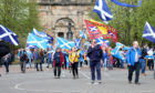 Scottish Independence supporters marching through the streets of Glasgow, as part of the All Under One Banner event on May 5 2018.