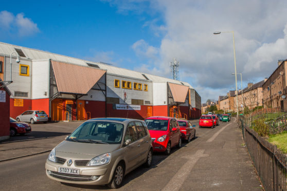 Cars parked on Sandeman Street.