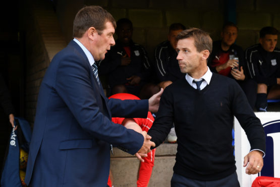 Tommy Wright and Neil McCann.
