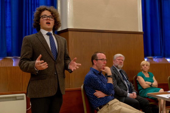 Councillor Dominic Nolan speaking at a recent public meeting.