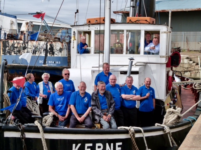 Members of The Steam Tug Kerne Preservation Society Ltd. who were presented with The Queen's Award for Voluntary Service, the equivalent of an MBE for volunteer groups, at an awards ceremony at the Liverpool docks.