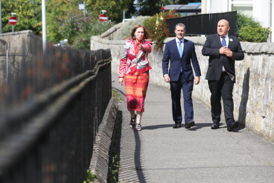 Jane Ann Liston, Michael Matheson and Dita Stanis-Traken on what used to be part of the old railway in St Andrews.