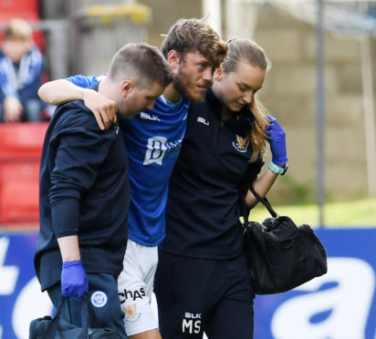 Murray Davidson is helped off against Dundee.