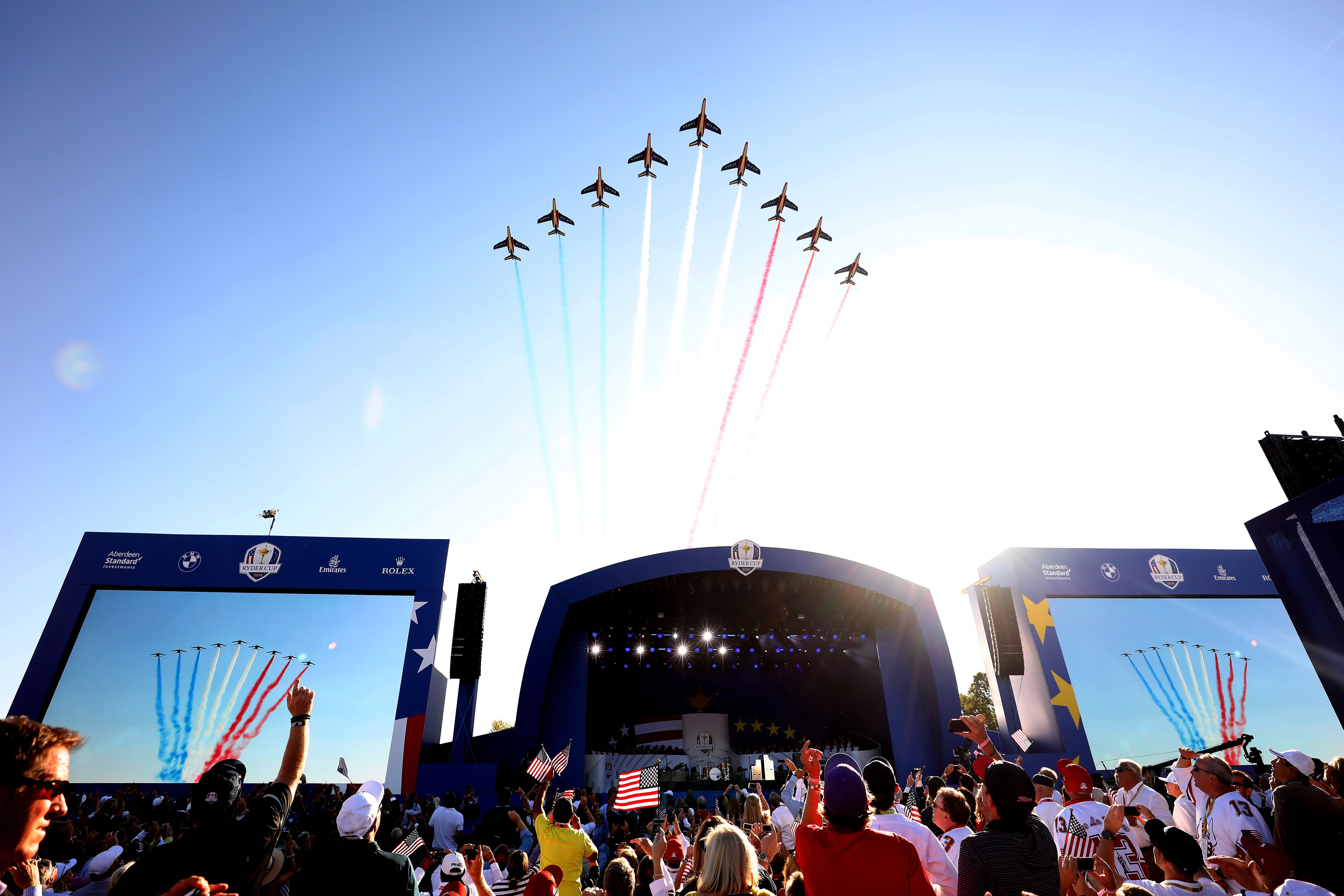 The Patrouille de France fly over during the opening ceremony for the 2018 Ryder Cup at Le Golf National.