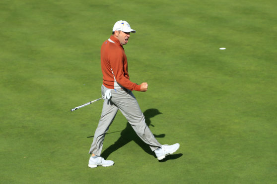 Sergio Garcia celebrates winning the match on the 17th green during the morning fourball matches of the Ryder Cup at Le Golf National.