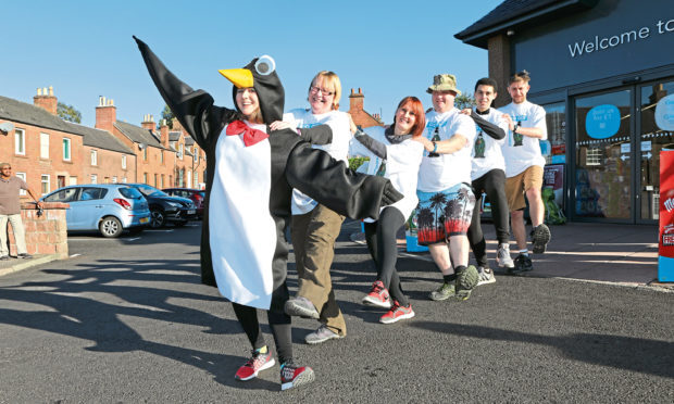 The Peter Panguin Waddlers from the Co-op in Kirriemuir: Ciara McKay, Tracey Inglis, Kseivixa Haggart, Charlie Delve, Vincent Allan & Rory Devaughn.