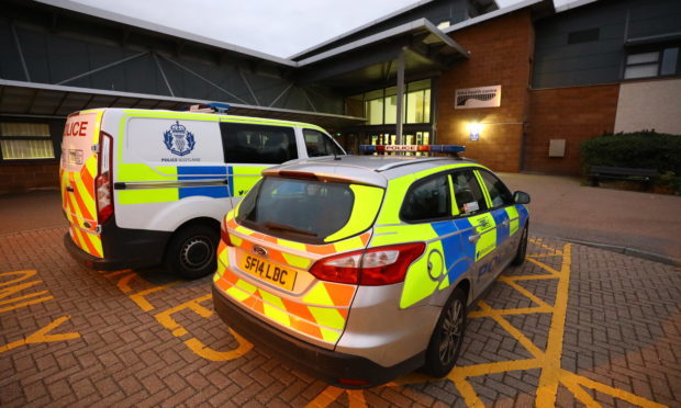 Police at the scene at Links Health Centre after Gibson's rampage.