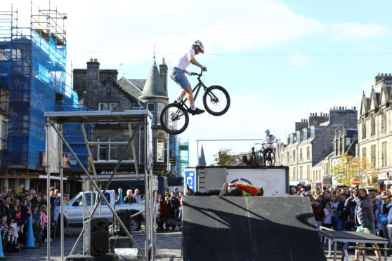 The Clan Stunt Bike Team performed a fantastic display, with one of the event organisers, Alistair Macleod (willingly!) taking part, at the Car Free Day in Market Street, St Andrews.