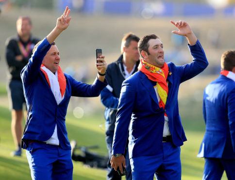 Team Europe's Ian Poulter (left) and Jon Rahm.