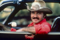Burt Reynolds in the car from Smokey and the Bandit;