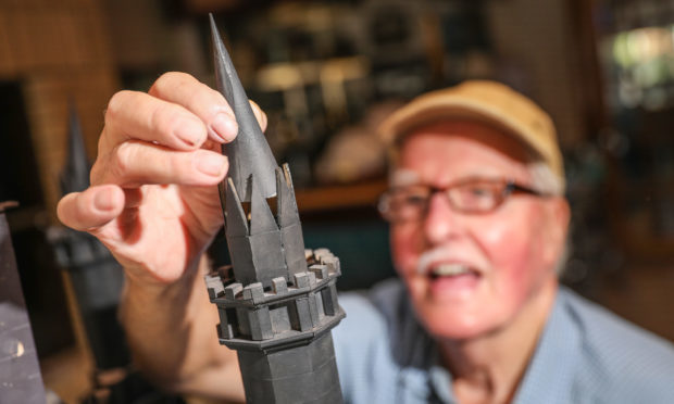 Rick Diamond with the model of the Scott Monument.