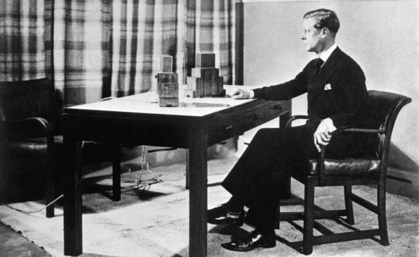 King Edward VIII makes his first broadcast to the world in 1936.