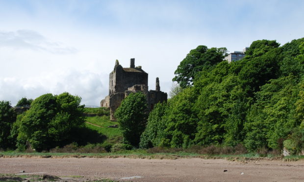 A view along the beach toward Ravenscraig Castle
