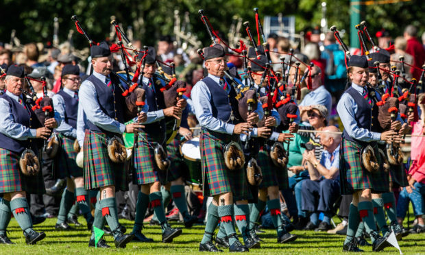 Pipe bands parade at the Pitlochry Games.