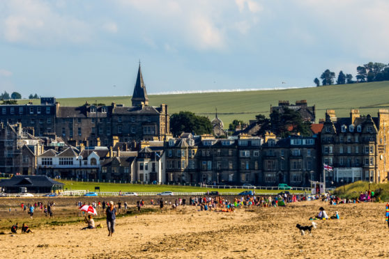 The East Neuk can 'feel overwhelmed' by the number of holiday residents, says a Fife MSP