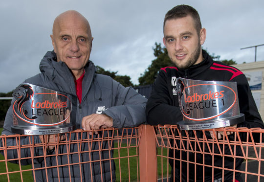 Assistant manager Ian Campbell (left) receives the Ladbrokes League 1 Manager of the Month award for August, on behalf of his brother Dick Campbell, the Arbroath manager. He's pictured alongside Ryan Wallace, also of Arbroath, who wins the Player of the Month award for August