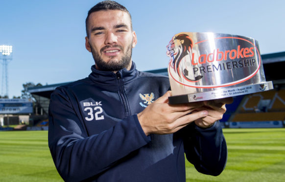 Tony Watt with his award.