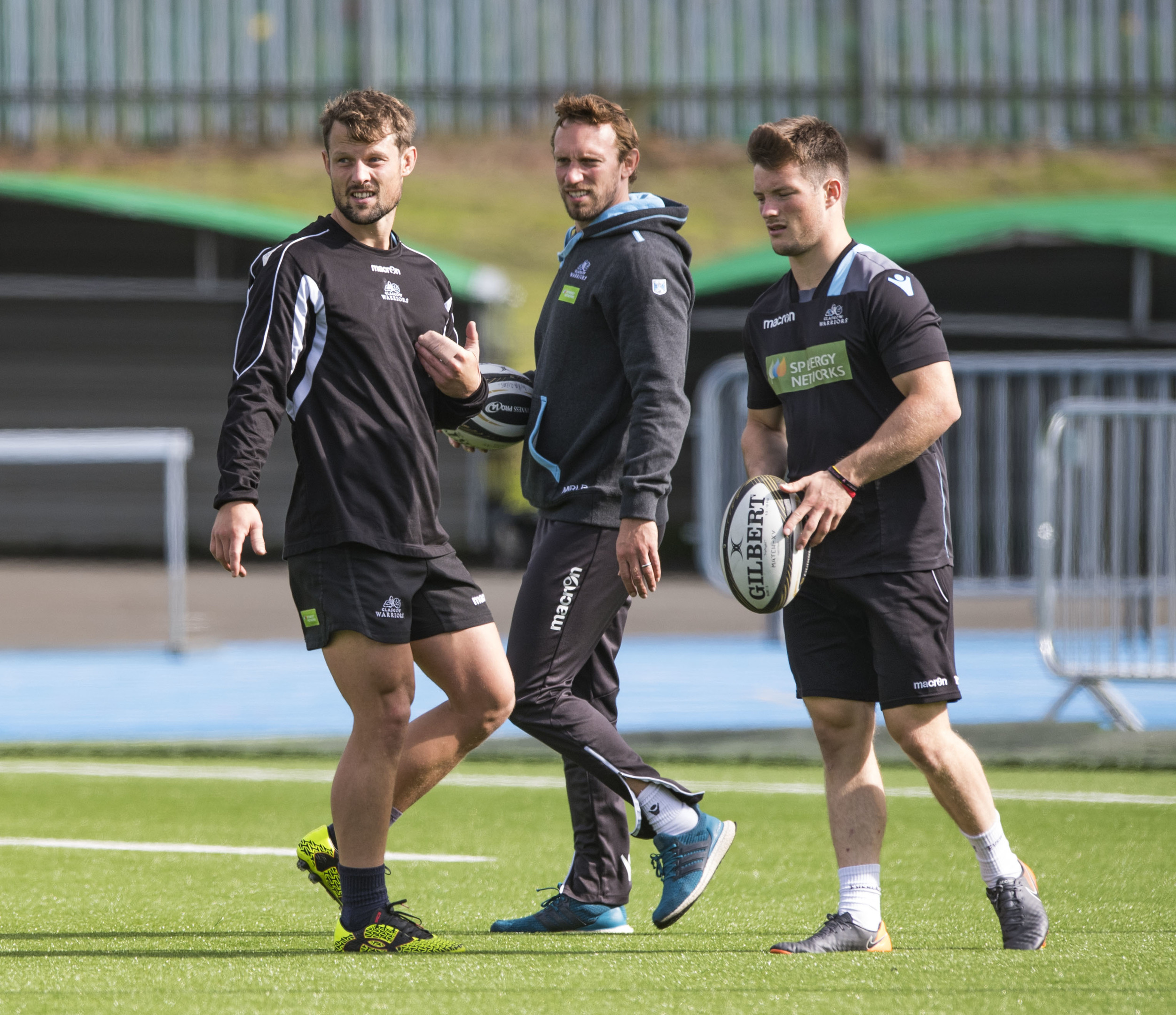 06/09/18
 SCOTSTOUN - GLASGOW
  Glasgow Warriors Peter Horne (left) and George Horne (right) with Warriors kicking coach Mike Blair (centre) at training
