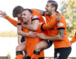 Dundee United players celebrate