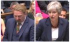 Chris Law and Theresa May during PMQs today.