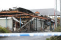 The aftermath of the fire that tore through the Hilltown Indoor Market and Fit4Less gym on Main Road, Hilltown.