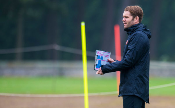 Robbie Neilson takes training at St Andrews.