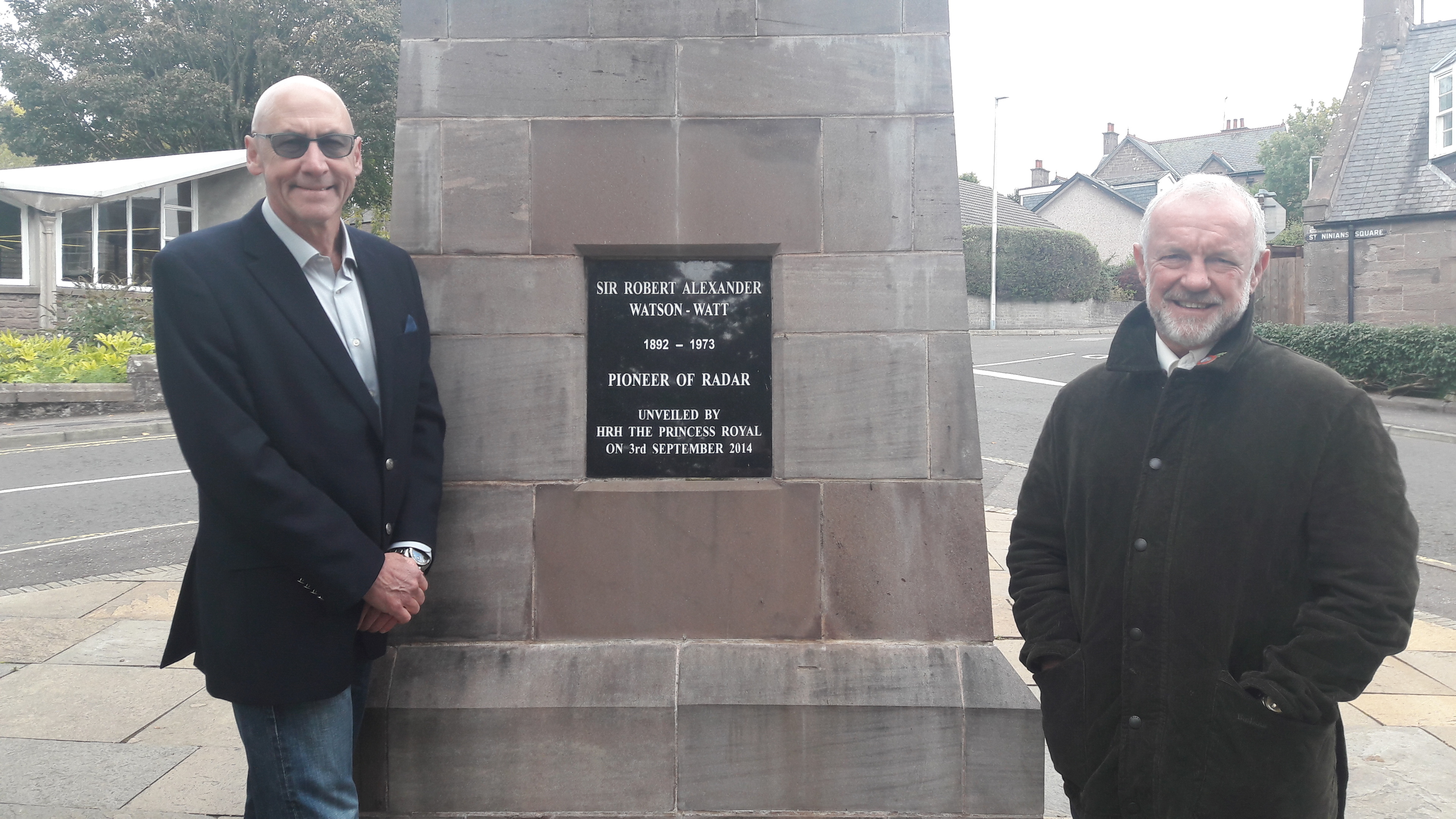 Candian researcher Bryan Davies and Steve Nicoll of Brechin at the Watson-Watt statue in the Angus town's St Ninian's Square