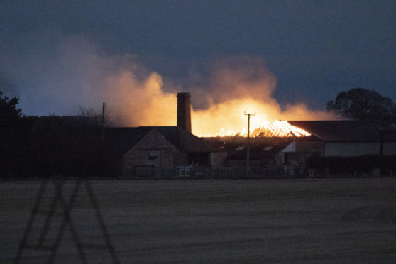 The farm building well alight.


Pic Paul Reid