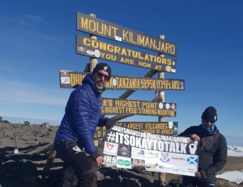 Alex McClintock (left) and Adam Allison at the summit.