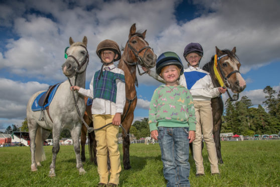 Sisters Georgie, Bo and Eilidh Robertson and their ponies Foxy and Hasty at Blair Horse Trials in 2018.