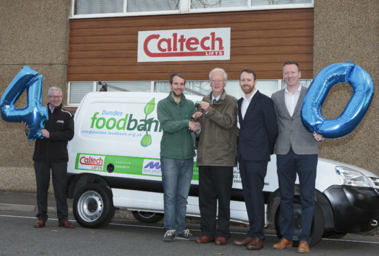 Caltech Lifts founder Howard Renwick (3rd right) hands over the keys for the new van to Dundee Foodbank Warehouse Coordinator, Michael Calder, watched by (from left) Murdo Macintosh, Andrew Renwick and Fraser Renwick.