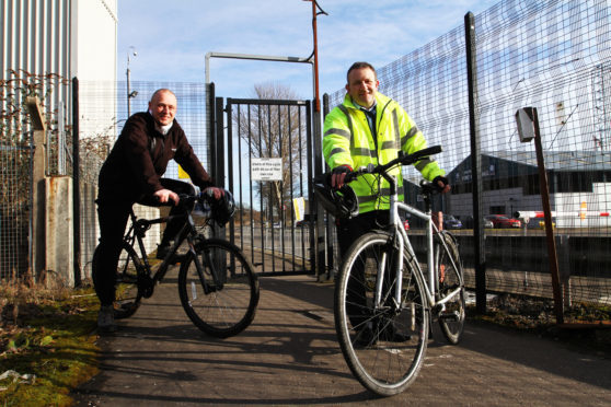 Councillor Kevin Cordell, cycling spokesperson and John Berry, sustainable transport team leader at the cycle route through Dundee docks.