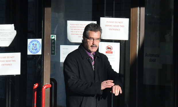 John Morrison leaves Dunfermline Sheriff Court.

(c) David Wardle